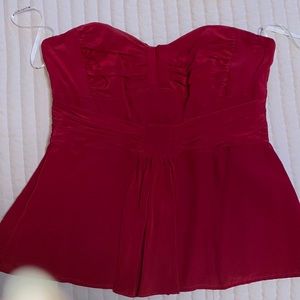 Red strapless top.
